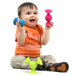 6 months & up. PipSquigz™ are perfect for little hands! Push them together and POP them apart. Made of top-quality silicone, these "suction construction" pieces will stick to virtually any flat surface and to each other. Includes tactile features and sounds that rattle and pop! Set of 3.