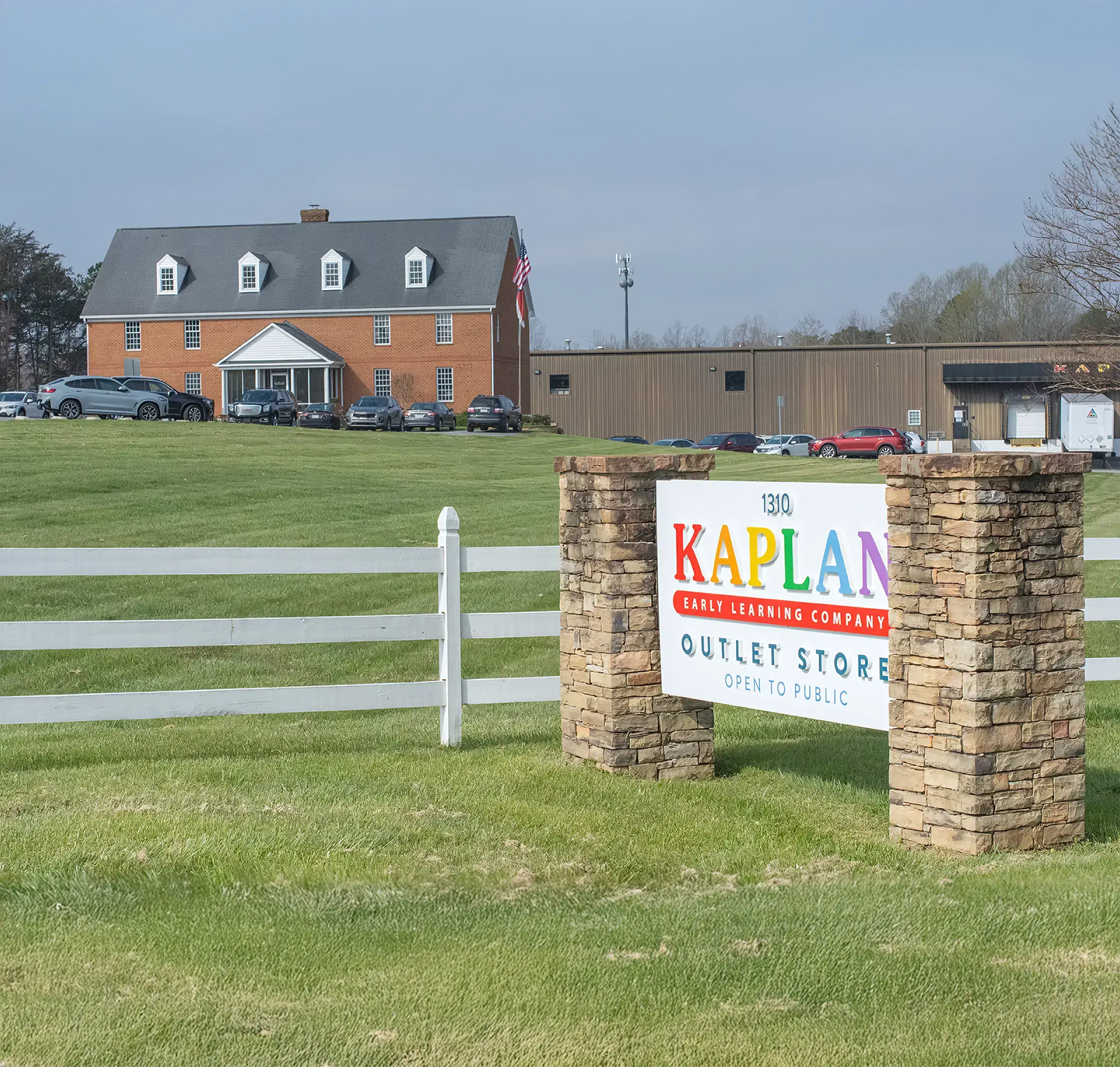 Recent photo of the Kaplan corporate headquarters with the sign in the foreground