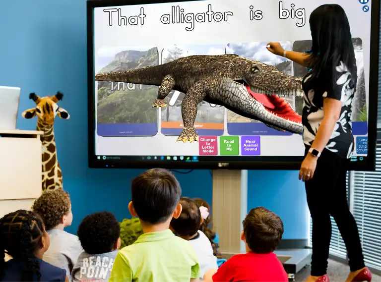 Preschool teacher using Letters Alive interactive activities