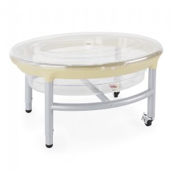 18 months & up. The natural color base and clear tub will fit in any classroom decor. Features a deep clear tub and adjustable legs from 19" to 25". Use Indoors or outdoors. Table has a 5 year warranty.