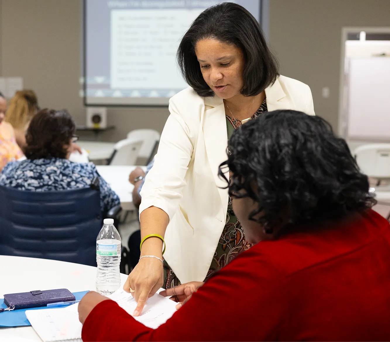 Teacher using an assessment with a child