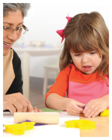 Teacher and Child Playing with Clay and Dough