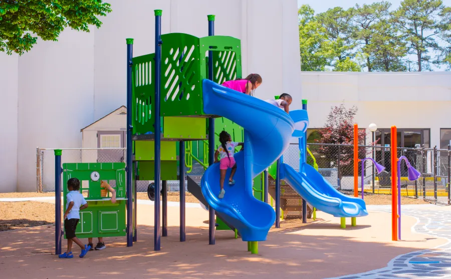 Children playing on a playground set