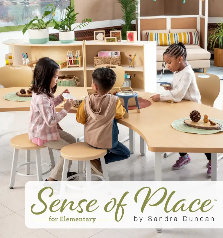 Children sitting around Sense of Place curved tables engaging in activities