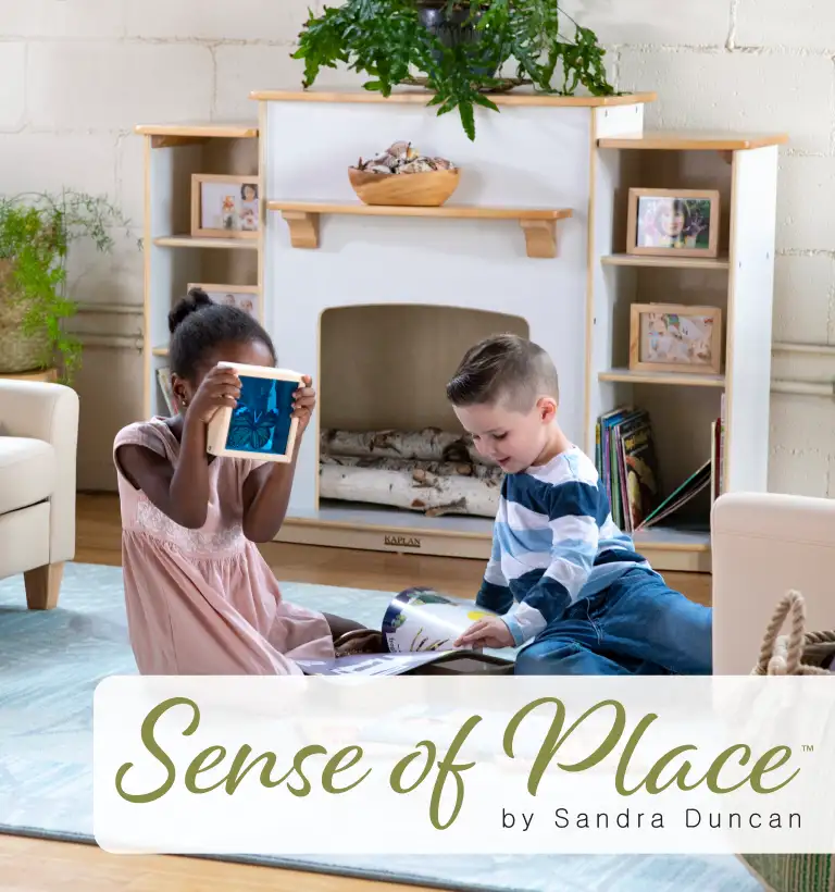 Children playing on the floor in front of the Sense of Place Fireplace