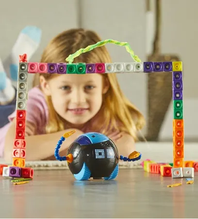 Young girl using Cooper the Stem Robot