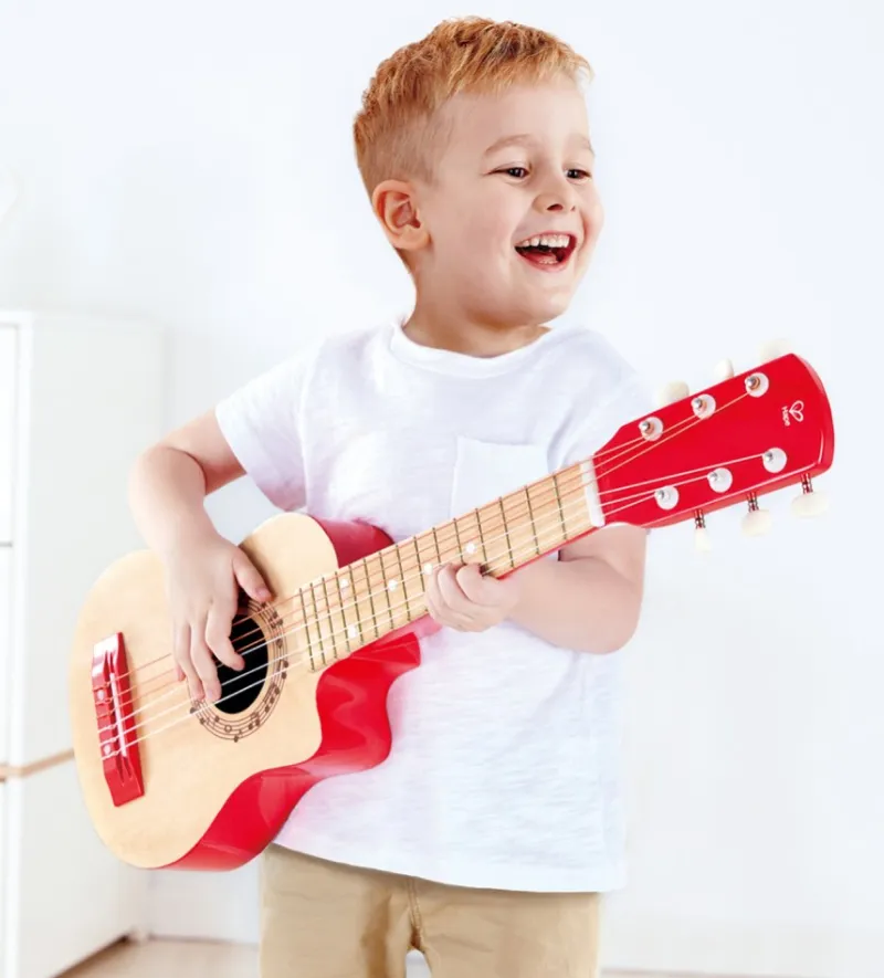 Child playing with the Sight and Sound Drum