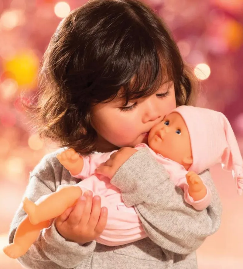 Boy standing with the Little Tikes Cozy Truck