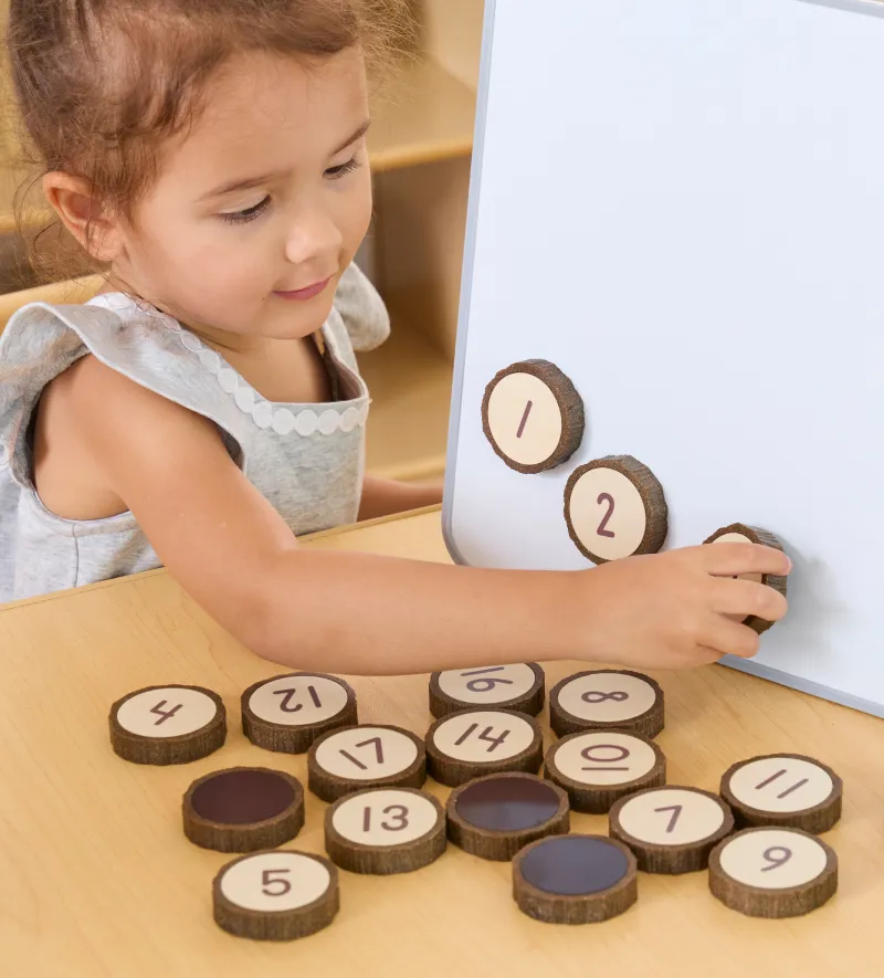 Wooden shelves with various storage bins and containers