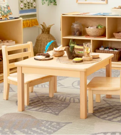 Small wooden table and chairs for preschool children