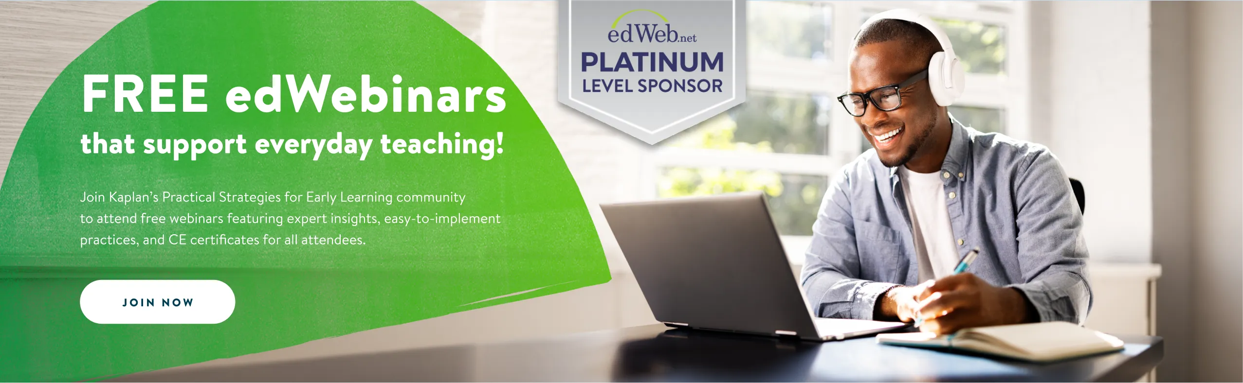 Man watching a webinar on a laptop computer