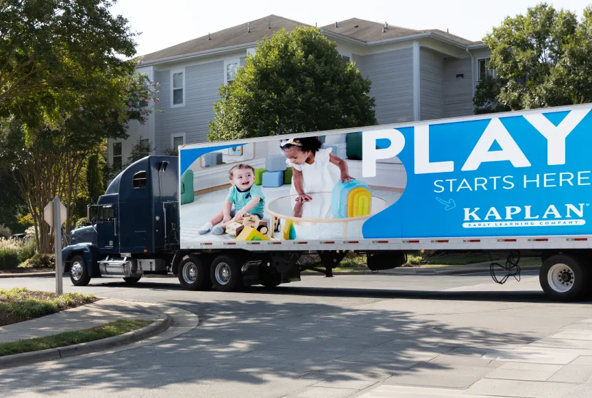 A truck delivering playground equipment
