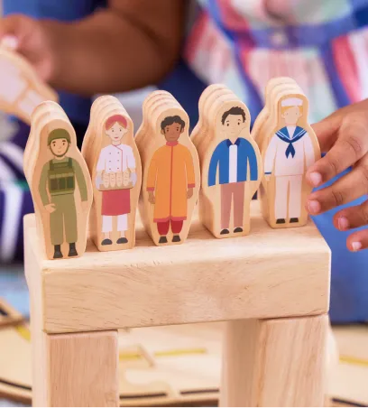 Small wooden people blocks
