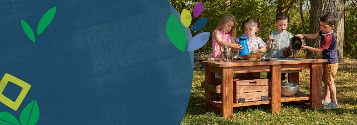 Children outside playing at the Nature to Play Mud Kitchen