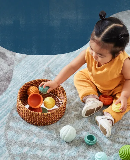 Child playing with Textured Mix and Match Balls